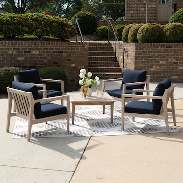 Annotto Bay Outdoor Coffee Table and 4 Lounge Chairs