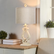 castor distressed off white table lamp   