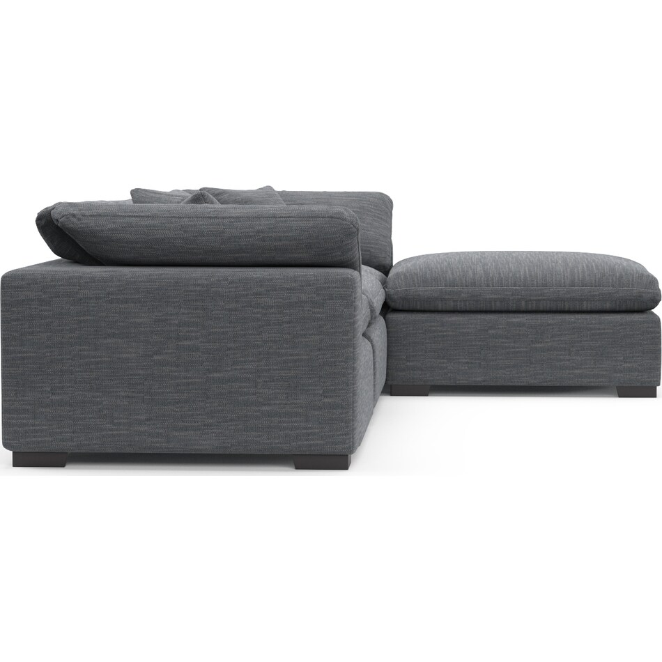 plush blue  pc sectional and ottoman   