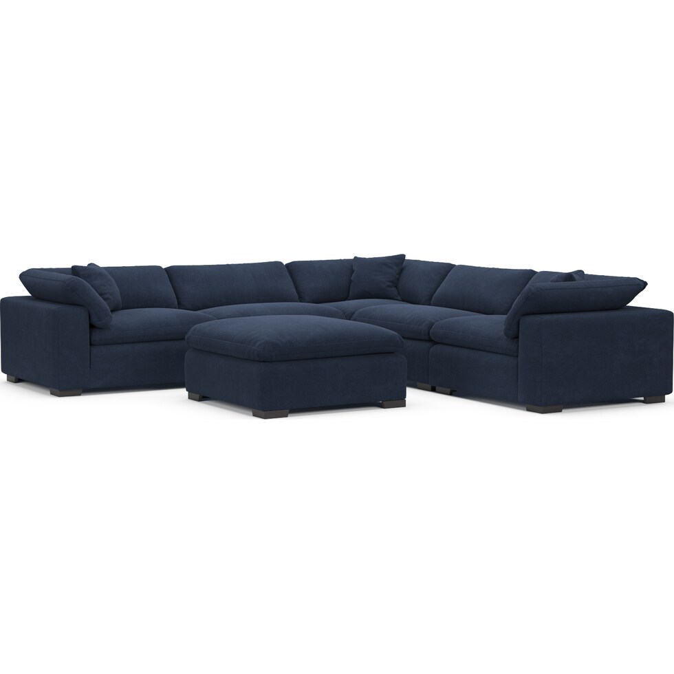 plush blue  pc sectional and ottoman   
