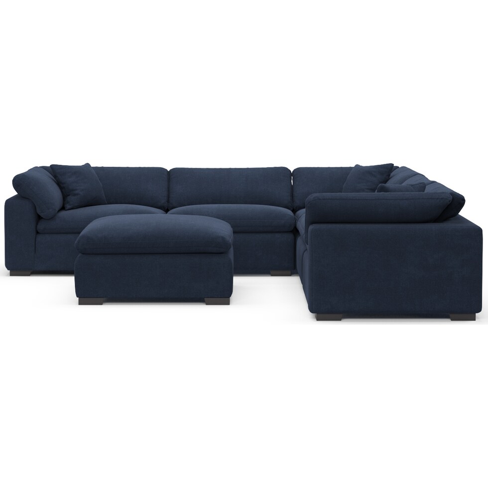 plush blue  pc sectional and ottoman   