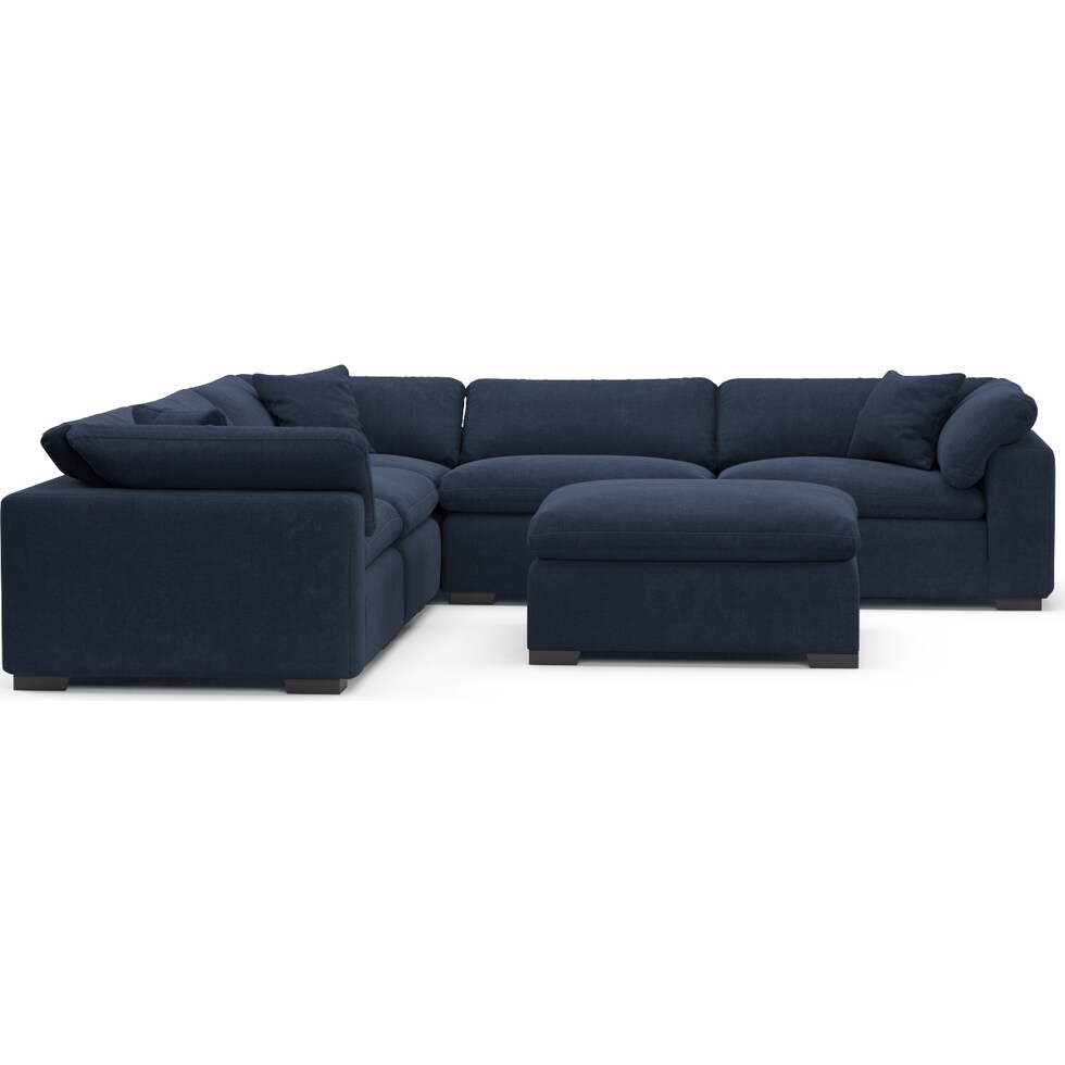 plush blue  pc sectional and ottoman   