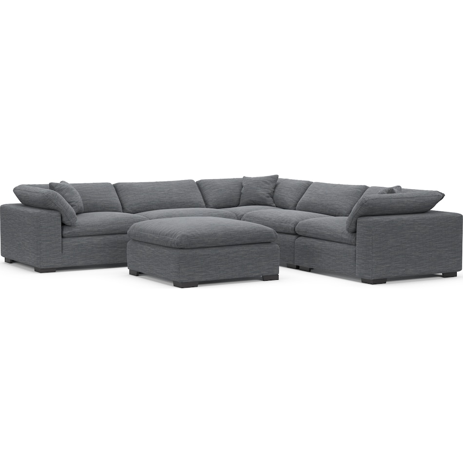 plush blue  pc sectional and ottoman   