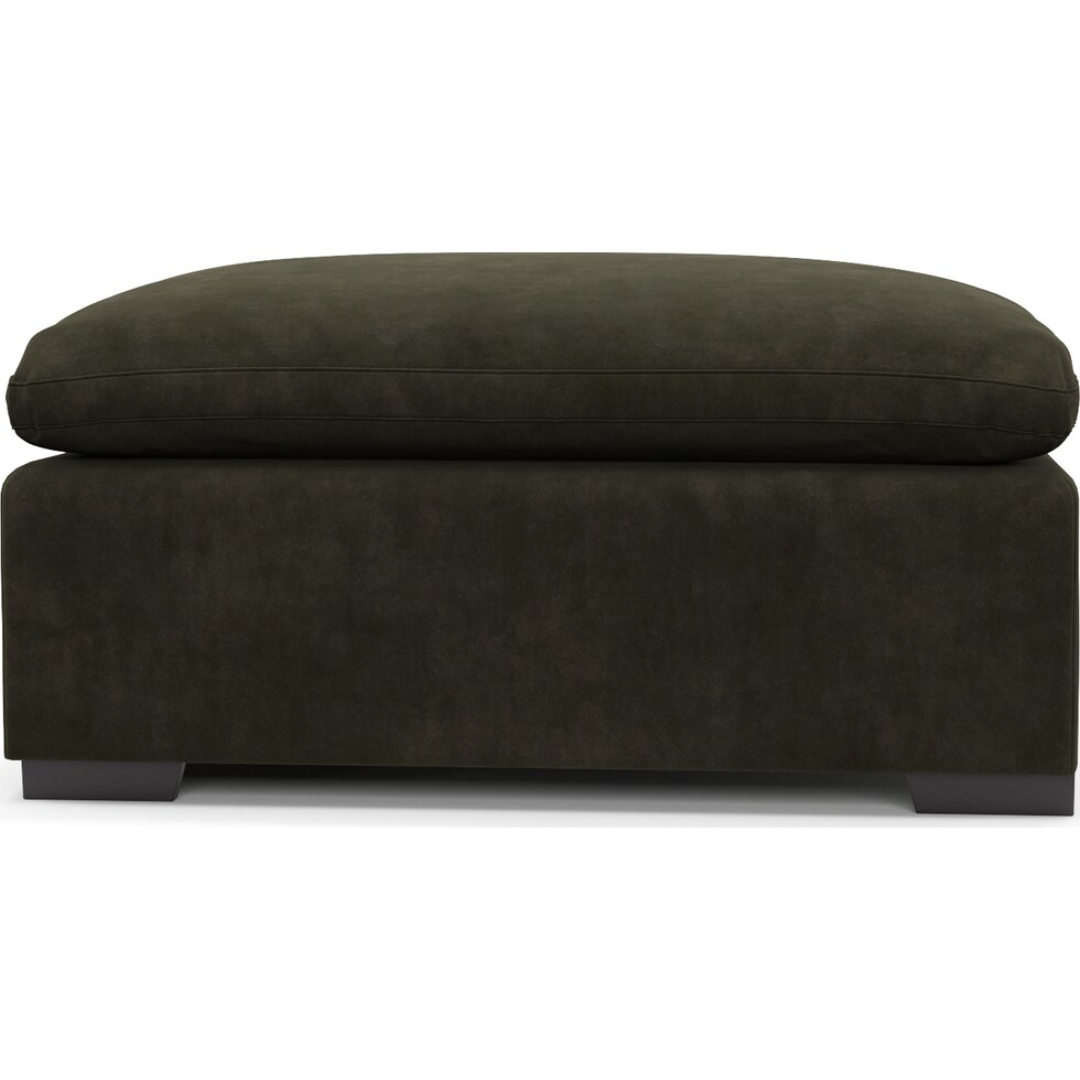 plush green ottoman   