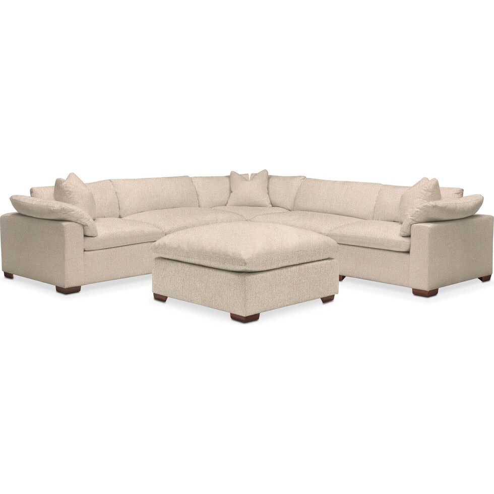 plush light brown  pc sectional and ottoman   