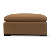 plush light brown ottoman   