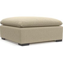 plush light brown ottoman   