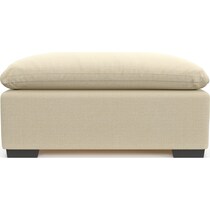 plush light brown ottoman   