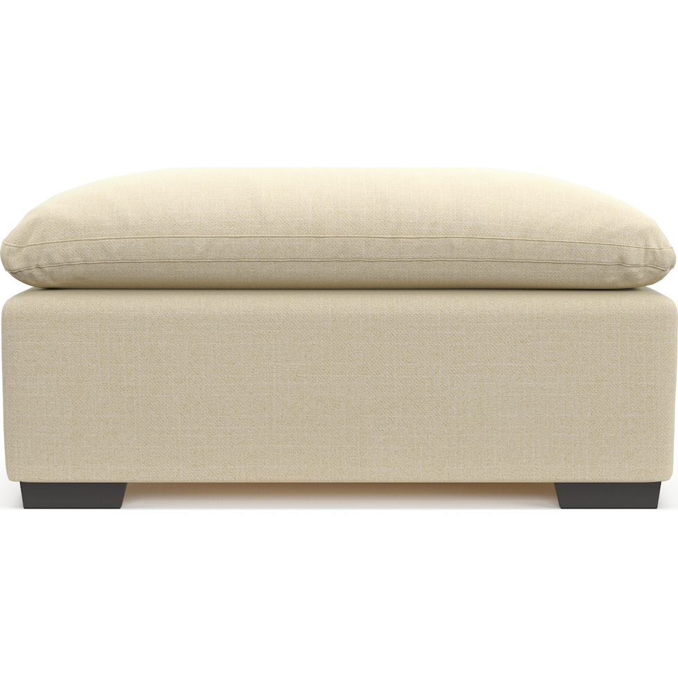 plush light brown ottoman   
