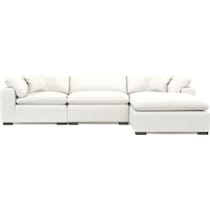 plush white  pc sectional and ottoman   