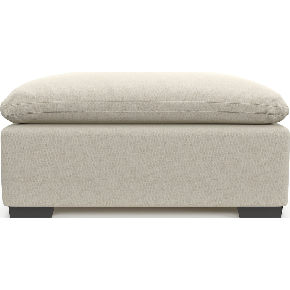 plush white ottoman   