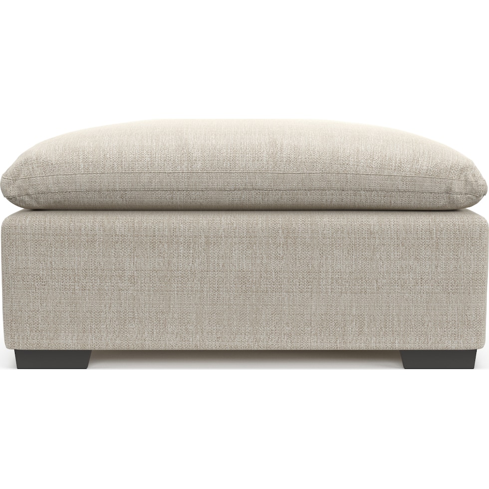 plush white ottoman   